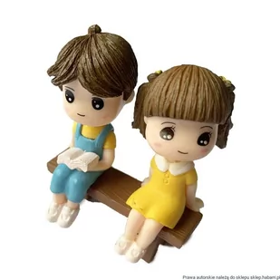 Dziewczynka i chłopiec z książką na ławeczce - Figurki kolekcjonerskie - miniaturka - grafika 1