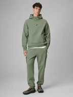 Spodnie sportowe męskie - 4F Spodnie dresowe cargo męskie - khaki XL - miniaturka - grafika 1