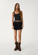 Spódnice - Stradivarius Spódnico-spodnie mini z falbanami Czarny M - miniaturka - grafika 1