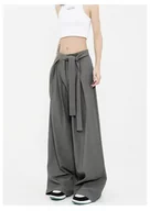Spodnie damskie - Szerokie wiązane damskie spodnie z plisami - Szary - miniaturka - grafika 1