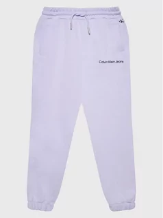 Spodnie i spodenki dla dziewczynek - Calvin Klein Jeans Spodnie dresowe Logo IG0IG01509 Fioletowy Relaxed Fit - grafika 1
