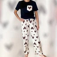 Piżamy damskie - Spodnie damskie do spania piżama serca beżowe - miniaturka - grafika 1