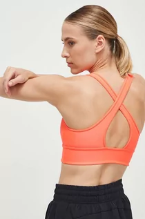 Bielizna sportowa damska - Under Armour biustonosz sportowy Crossback kolor pomarańczowy gładki - grafika 1