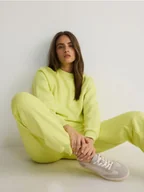 Spodnie damskie - Reserved - Dresowe spodnie jogger z bawełną - jasnozielony - miniaturka - grafika 1