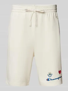 Szorty z dzianiny dresowej kroju regular fit z nadrukiem z motywem - Spodnie sportowe męskie - miniaturka - grafika 1