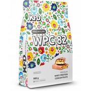 Odżywki białkowe - Białko KFD Premium WPC 82 900g  Baton Karmel-Orzech - miniaturka - grafika 1