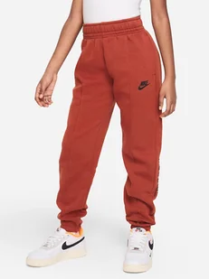 Nike Spodnie dresowe w kolorze ceglanym - Spodnie sportowe damskie - miniaturka - grafika 1