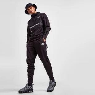 THE NORTH FACE SPODNIE T+L PANT BLK GRID CZARNY NF0A82DJ6H81 - The North Face - Spodnie sportowe męskie - miniaturka - grafika 1