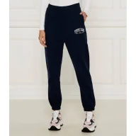 Dresy damskie - Tommy Jeans Spodnie dresowe RLX VARSITY Regular Fit - miniaturka - grafika 1