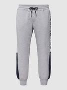 Spodnie sportowe męskie - Spodnie dresowe PLUS SIZE z detalami z logo model ‘Will’ - miniaturka - grafika 1