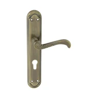 Klamki - Domino Klamka do drzwi wewnętrznych z długim szyldem do wkładki Casablanka 72 mm mosiądz/patyna - miniaturka - grafika 1