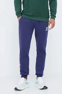 Spodnie męskie - Hummel spodnie dresowe kolor fioletowy z nadrukiem - grafika 1