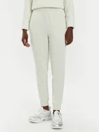 Spodnie sportowe damskie - Calvin Klein Performance Spodnie dresowe 00GWS4P651 Beżowy Relaxed Fit - miniaturka - grafika 1