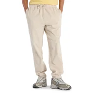 Spodnie sportowe męskie - Spodnie męskie New Balance MP53521TWF - beżowe - miniaturka - grafika 1