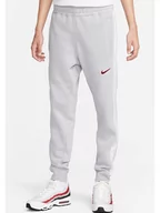 Spodnie sportowe męskie - Nike Spodnie dresowe w kolorze szaro-białym - miniaturka - grafika 1