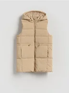 Kurtki i płaszcze dla dziewczynek - Reserved - Pikowana kamizelka z połyskiem - beżowy - miniaturka - grafika 1