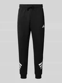 Spodnie sportowe męskie - Spodnie dresowe z elastycznym ściągaczem - miniaturka - grafika 1