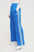 Spodnie damskie - adidas Originals spodnie dresowe kolor niebieski wzorzyste - miniaturka - grafika 1