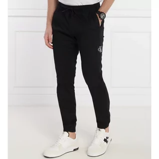 Spodnie męskie - CALVIN KLEIN JEANS Spodnie jogger MONOLOGO | Skinny fit - grafika 1