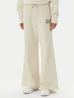 Spodnie sportowe damskie - EA7 Emporio Armani Spodnie dresowe 7W000106 AF12473 U1079 Beżowy Loose Fit - miniaturka - grafika 1