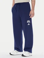 Spodnie sportowe męskie - adidas Spodnie dresowe Collegiate JM9179 Niebieski Regular Fit - miniaturka - grafika 1