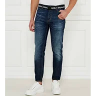 Spodnie męskie - HUGO Jeansy 634 Tapered fit - miniaturka - grafika 1