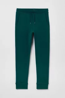 Spodnie i spodenki dla chłopców - OVS spodnie bawełniane dziecięce kolor zielony gładkie - grafika 1