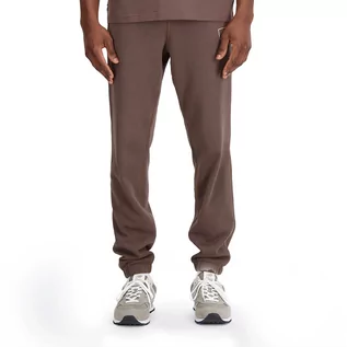 Spodnie sportowe męskie - Spodnie New Balance MP33509DUO - brązowe - grafika 1