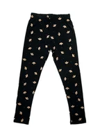 Legginsy - Dziewczęce legginsy z nadrukiem kwiatków czarne Tup Tup - miniaturka - grafika 1