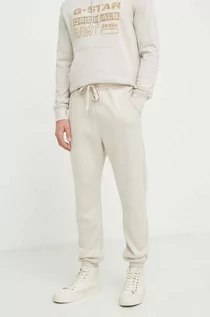 Spodnie męskie - G-Star Raw spodnie dresowe kolor beżowy gładkie - grafika 1