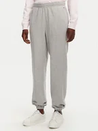 Spodnie sportowe damskie - Tommy Hilfiger Spodnie dresowe UW0UW05773 Szary Regular Fit - miniaturka - grafika 1