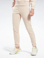Spodnie sportowe damskie - Reebok Spodnie dresowe Fleece IC3502 Beżowy Slim Fit - miniaturka - grafika 1