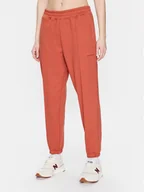 Spodnie sportowe damskie - New Balance Spodnie dresowe Athletics Nature WP23553 Pomarańczowy Relaxed Fit - miniaturka - grafika 1