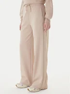 Spodnie sportowe damskie - Guess Spodnie dresowe V5BB12 KCX22 Beżowy Regular Fit - miniaturka - grafika 1