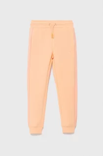 Spodnie damskie - Guess spodnie dziecięce kolor pomarańczowy gładkie - grafika 1