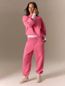 Spodnie sportowe damskie - 4F Spodnie dresowe joggery damskie - różowe XS - miniaturka - grafika 1