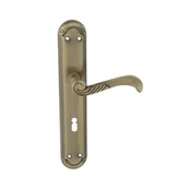 Klamki - Domino Klamka do drzwi wewnętrznych z długim szyldem pod klucz Casablanka 72 mosiądz/patyna - miniaturka - grafika 1