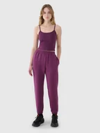 Spodnie sportowe damskie - 4F Spodnie dresowe joggery z modalem damskie - fioletowe S - miniaturka - grafika 1