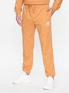 Spodnie sportowe męskie - New Balance Spodnie dresowe MP31539 Żółty Regular Fit - miniaturka - grafika 1