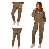 Spodnie damskie - Spodnie damskie dresowe luźne beżowe Captain Mike S/M - miniaturka - grafika 1