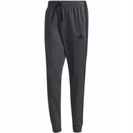 Dresy męskie - Spodnie męskie adidas Essentials French Terry Tapered Cuff 3-Stripes Pants - miniaturka - grafika 1