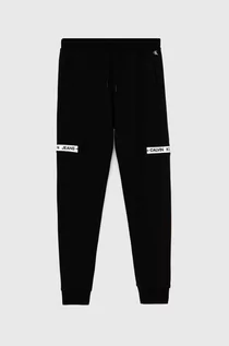 Spodnie damskie - Calvin Klein Jeans Jeans Spodnie dziecięce kolor czarny z aplikacją - grafika 1