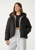 Kurtki damskie - Stradivarius Kurtka pikowana oversize z kapturem Czarny M - miniaturka - grafika 1