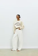 Bluzy damskie - Stradivarius Bluza haftowana Szary XL - miniaturka - grafika 1