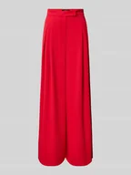 Spodnie damskie - Spodnie materiałowe z szeroką nogawką i plisami - miniaturka - grafika 1