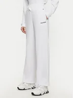 Spodnie sportowe damskie - Tommy Hilfiger Spodnie dresowe UW0UW05577 Biały Relaxed Fit - miniaturka - grafika 1