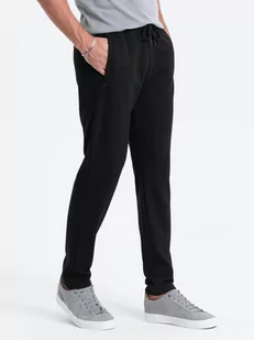 Męskie spodnie dresowe o marchewkowym kroju - czarne V1 OM-PASK-0166 - Spodnie męskie - miniaturka - grafika 1