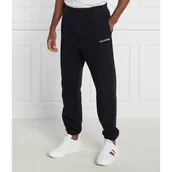 Spodnie sportowe męskie - Tommy Hilfiger Spodnie dresowe MONOTYPE EMBRO SWEATPANT Regular Fit - miniaturka - grafika 1