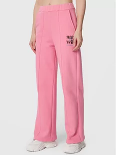 Femi Stories Spodnie dresowe Flare Różowy Relaxed Fit - Spodnie sportowe damskie - miniaturka - grafika 1
