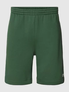 Spodnie sportowe męskie - Szorty o kroju regular fit z elastycznym pasem - grafika 1